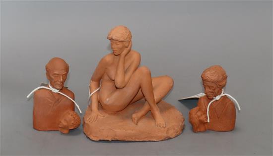 A terracotta model of a seated nude by Eric Griffiths and two similar double busts